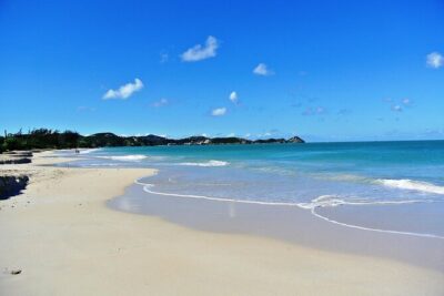 Famous Red Phone Booth Beach (Dickenson Bay) and Fort Bay Beach
